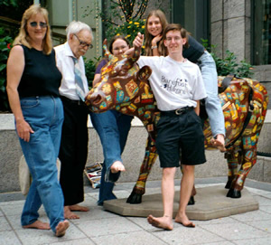 Barefoot group in NYC with Bull Statue