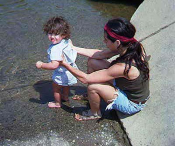 Sarah and Lily Clean the Mud from Their Soles